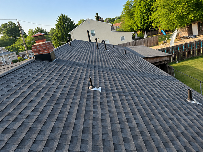 Residential home with professionally installed asphalt shingle roofing