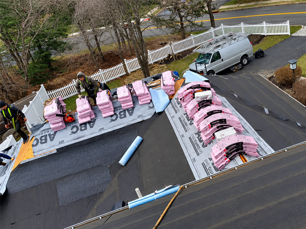 Residential roof repair involving damaged asphalt shingles in Hunterdon County NJ