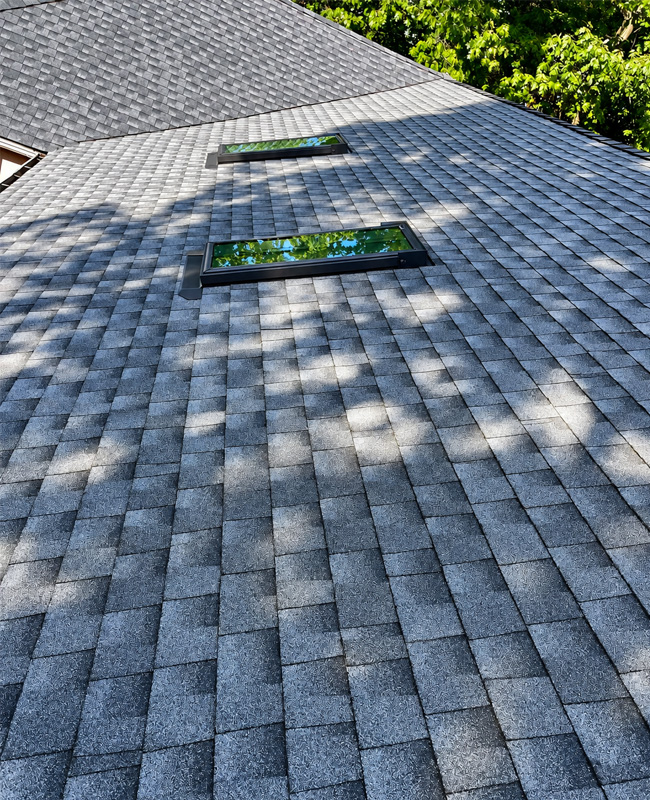 Completed residential asphalt shingle roofing project by 1 New View Construction